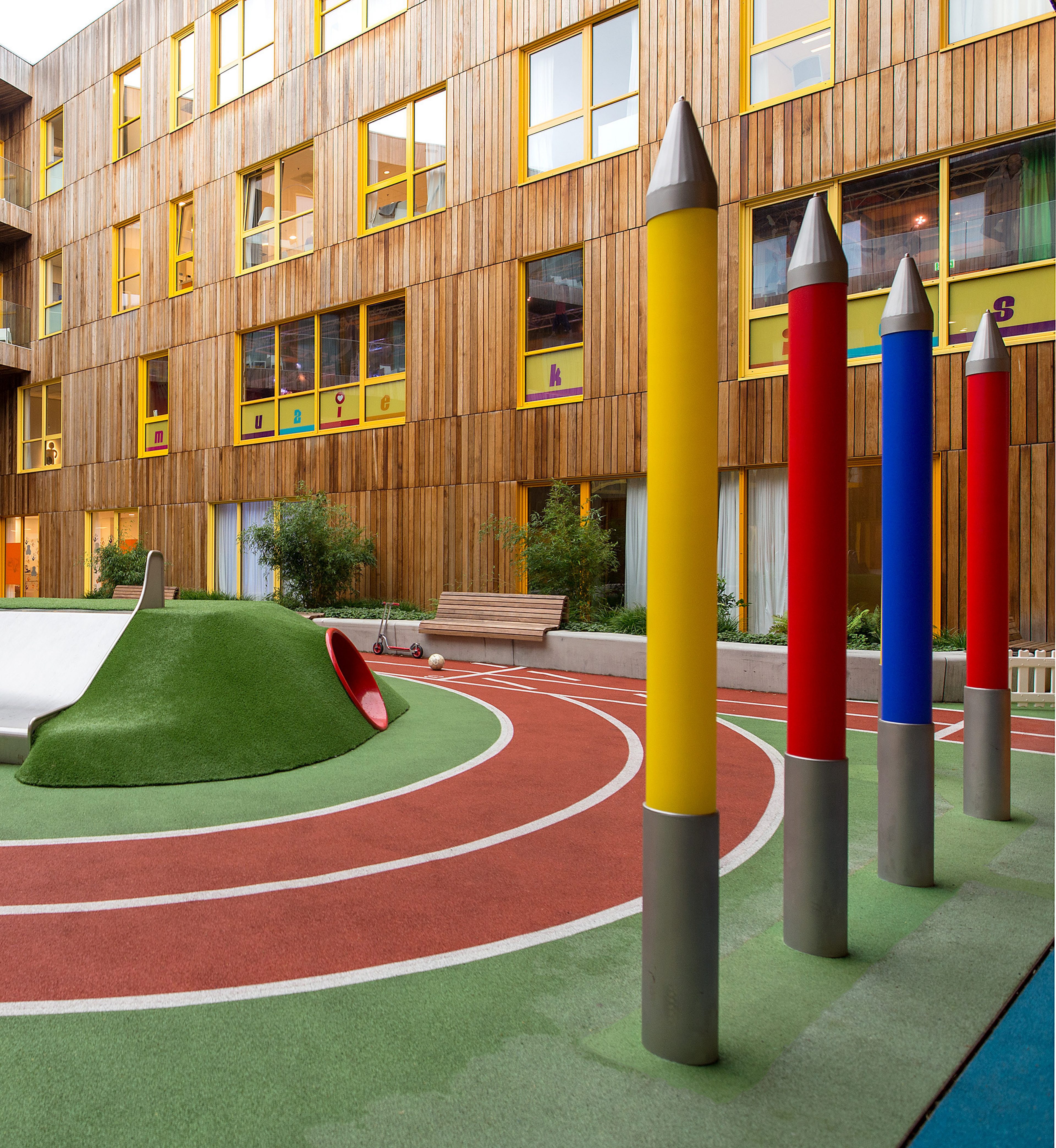 Multi-colored pencils for adventure playground